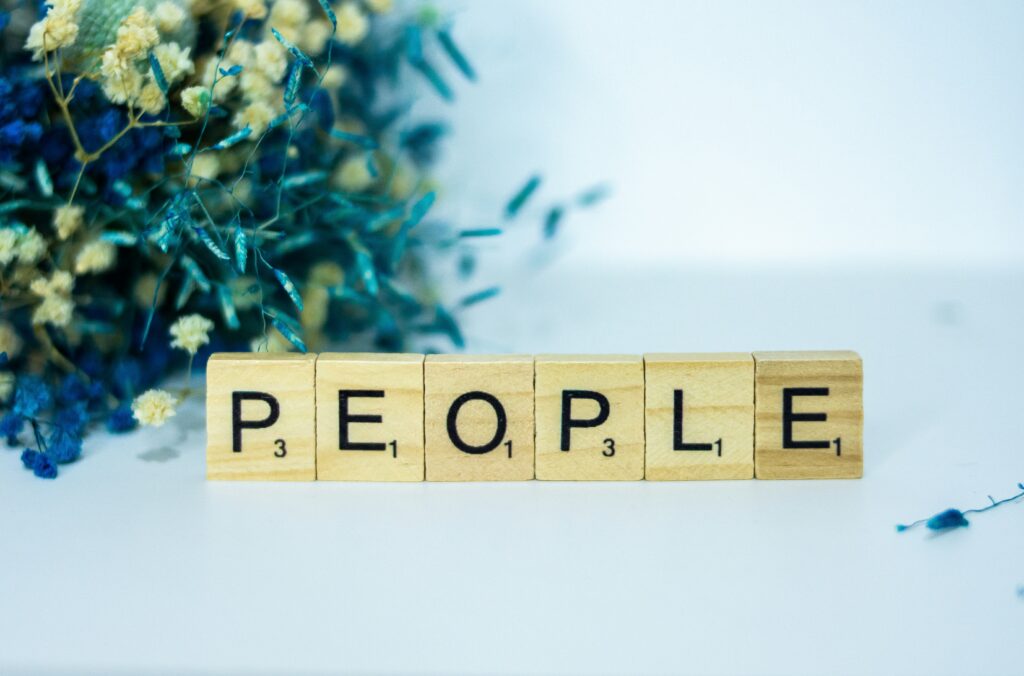 Scrabble tiles showing the word people